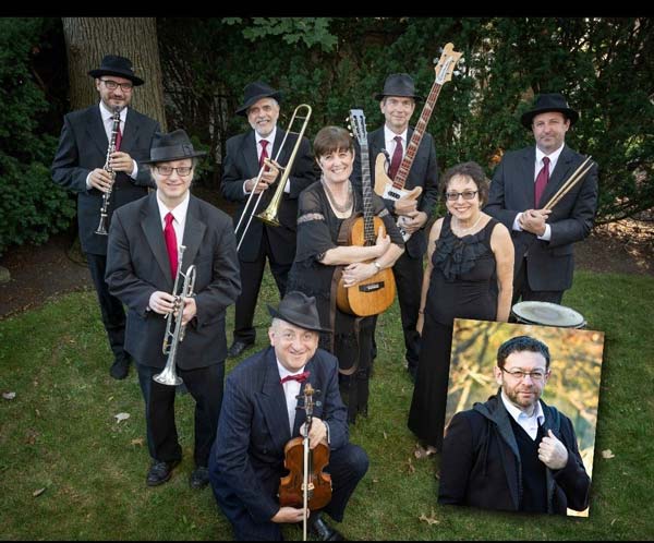 Maxwell Street Klezmer Band outside in grass